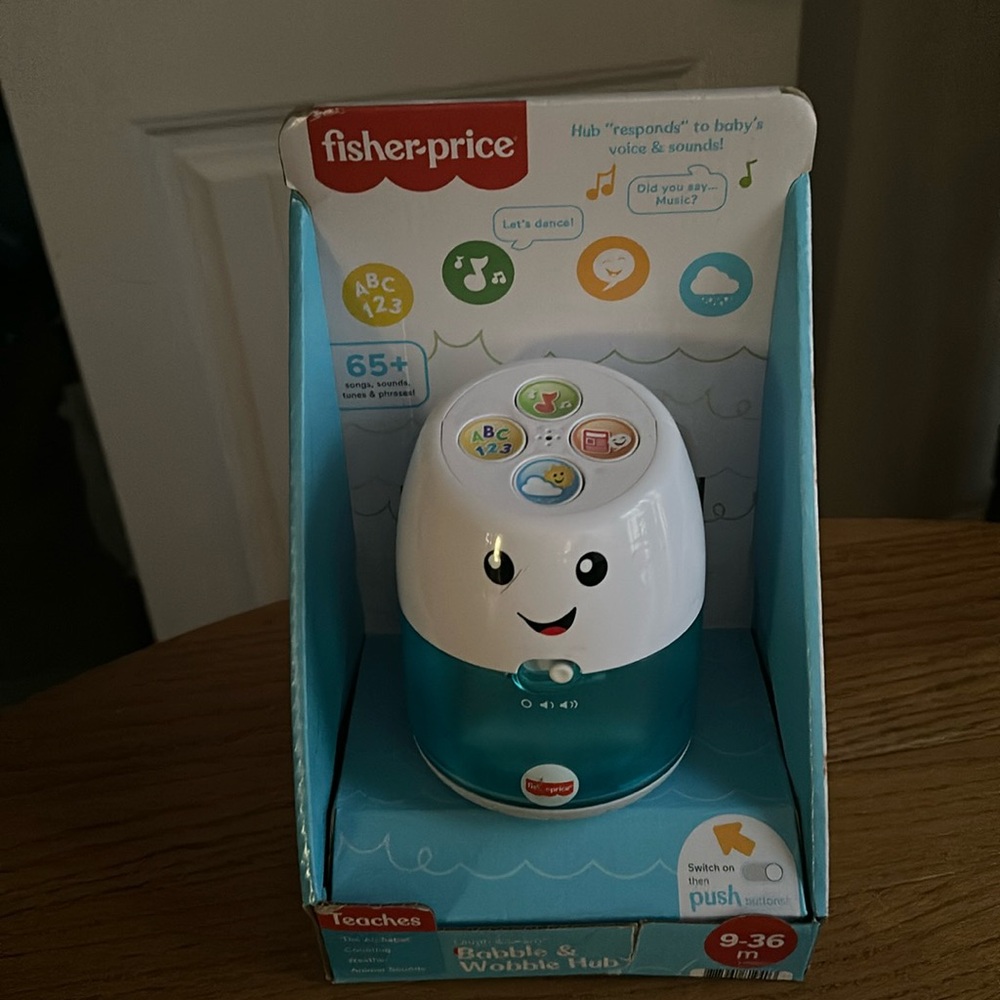 New Fisher price laugh and learn babble and wobble